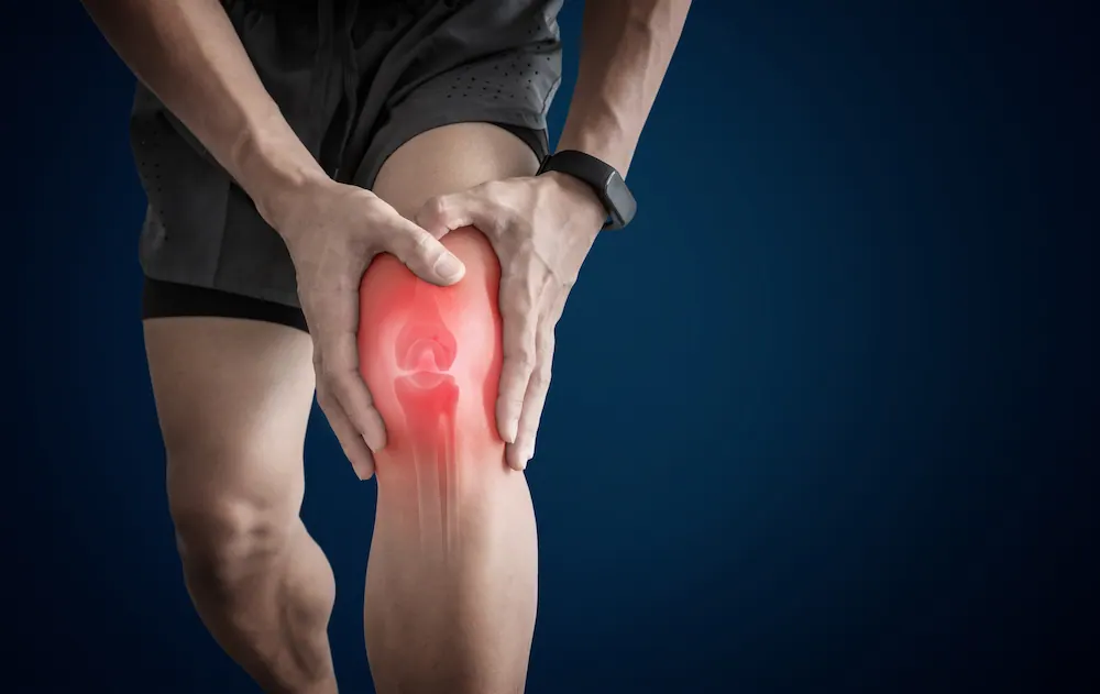Athlete experiencing repetitive motion shoulder pain from sports-related overuse injury