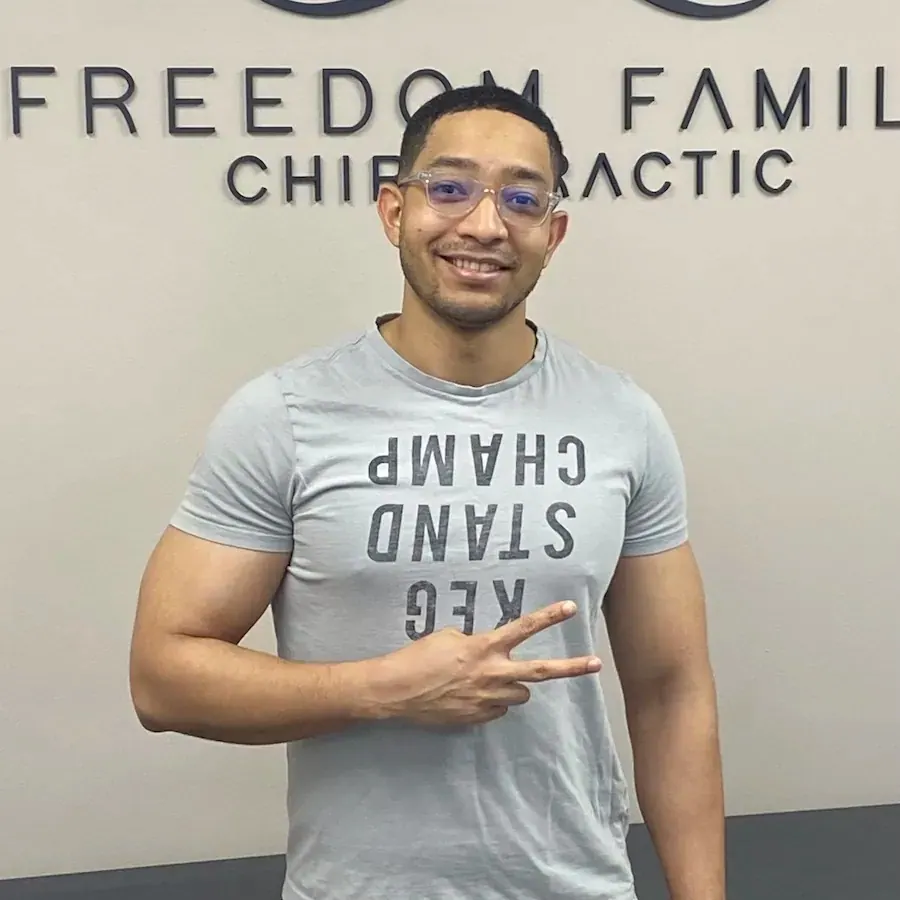 Patient posing after chiropractic visit