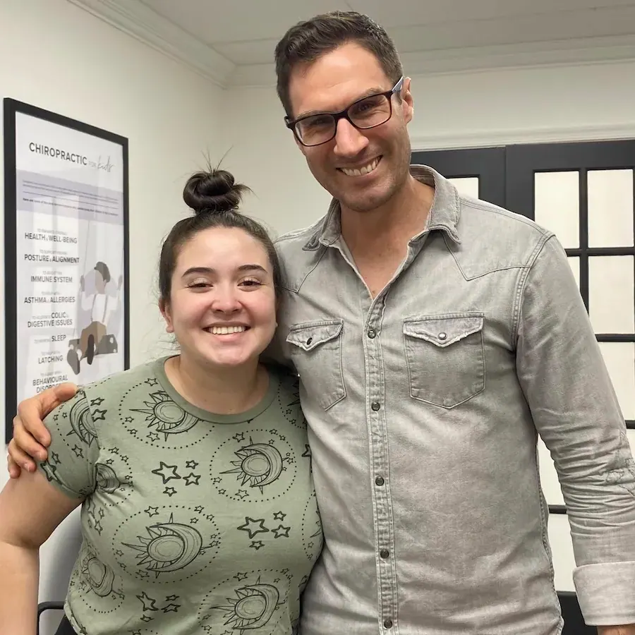 Dr. David Ridos chiropractor with patient