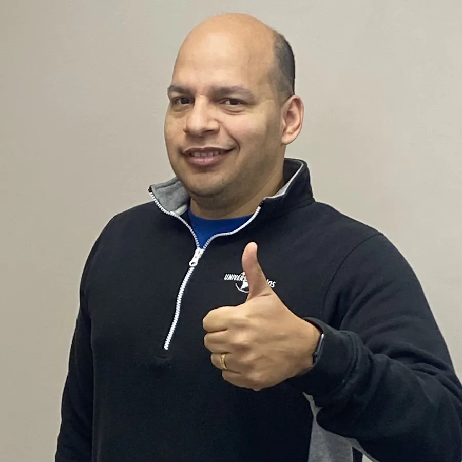 Patient giving thumbs up after visit