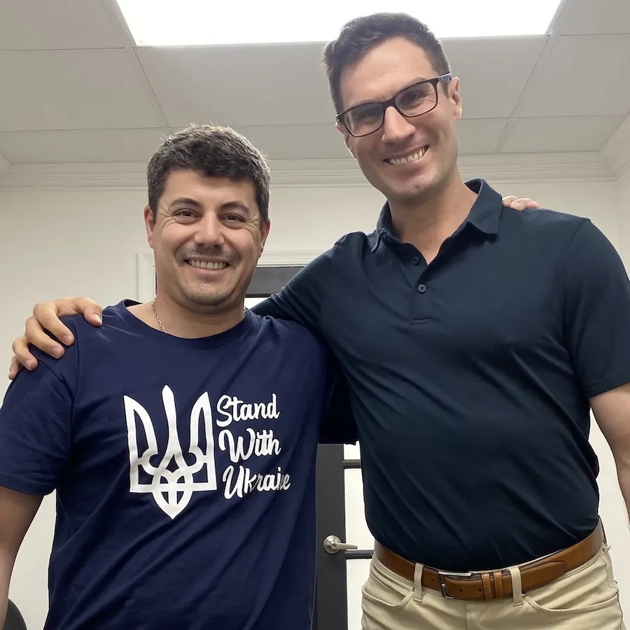 Dr. David Ridos posing with patient