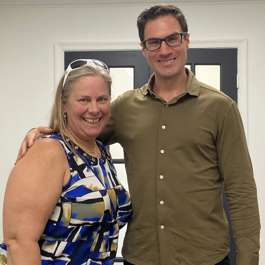 Dr. David Ridos with patient at chiropractic office