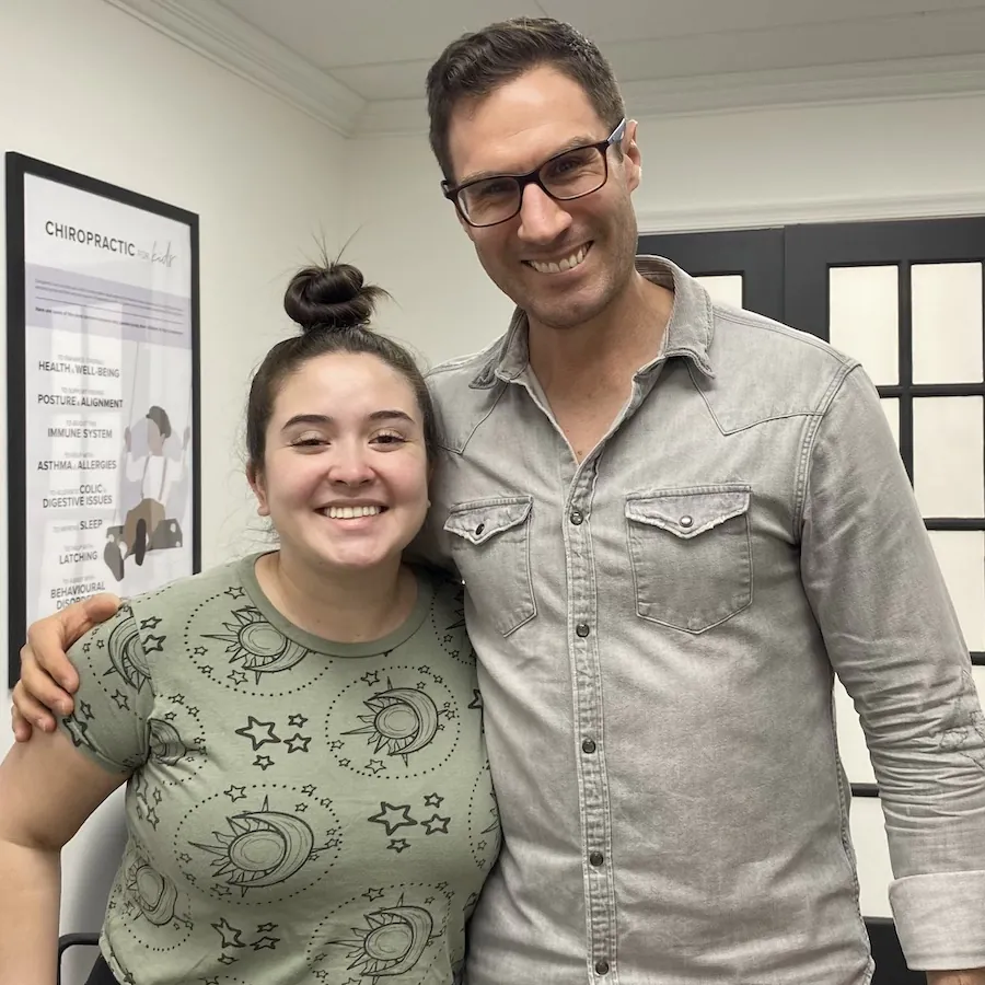 Dr. David Ridos chiropractor with patient